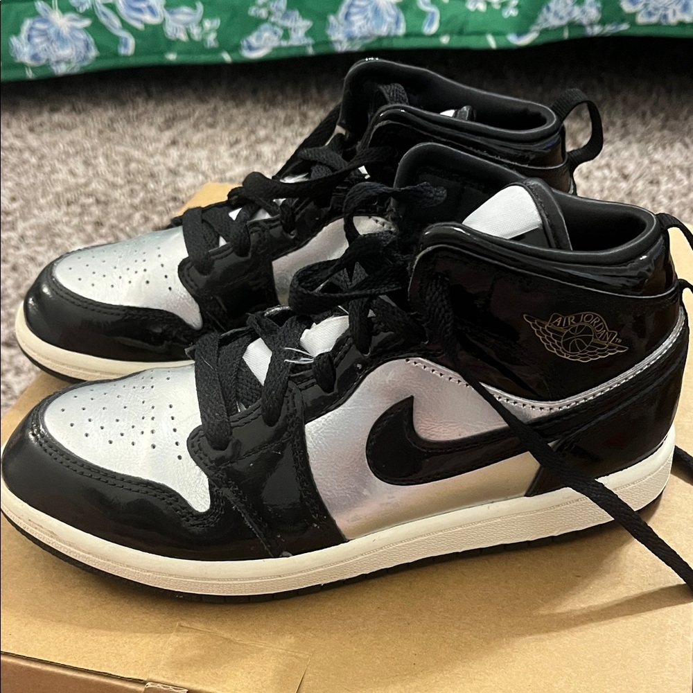 Black and Silver High-Top Jordans